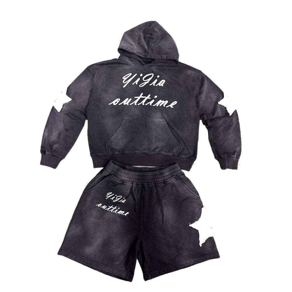 Dark hoodie and shorts set with matching artwork